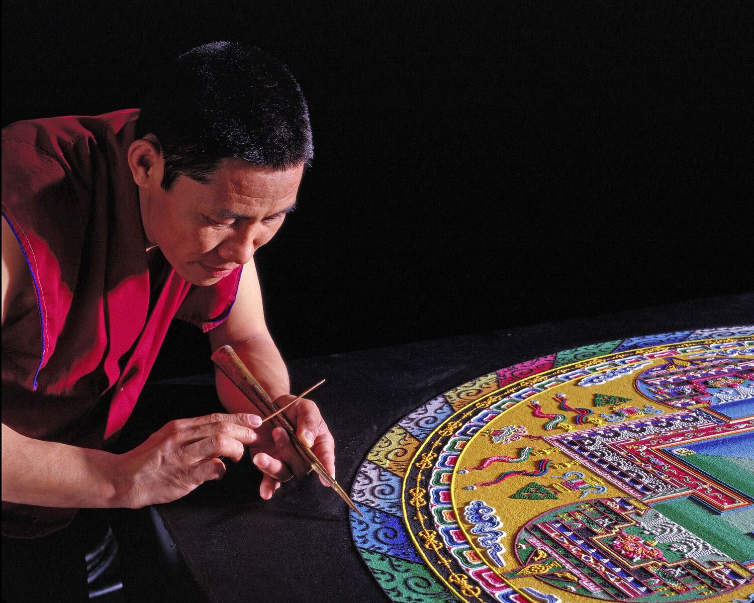 Tibetan Buddhist Monks to Construct a Mandala Sand Painting