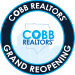 COBB REALTORS® CELEBRATES ITS GRAND REOPENING WITH RIBBON CUTTING IN COBB